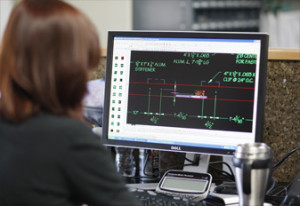 female engineer looking at building layout