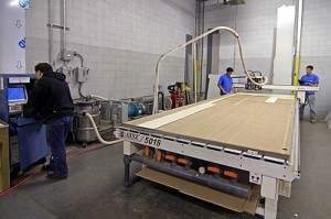 People working in a fabrication shop