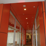 Educational facility with orange Trespa panels