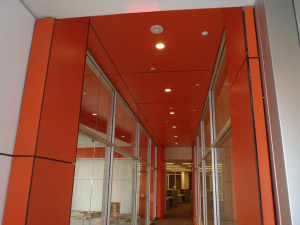 Educational facility with orange Trespa panels